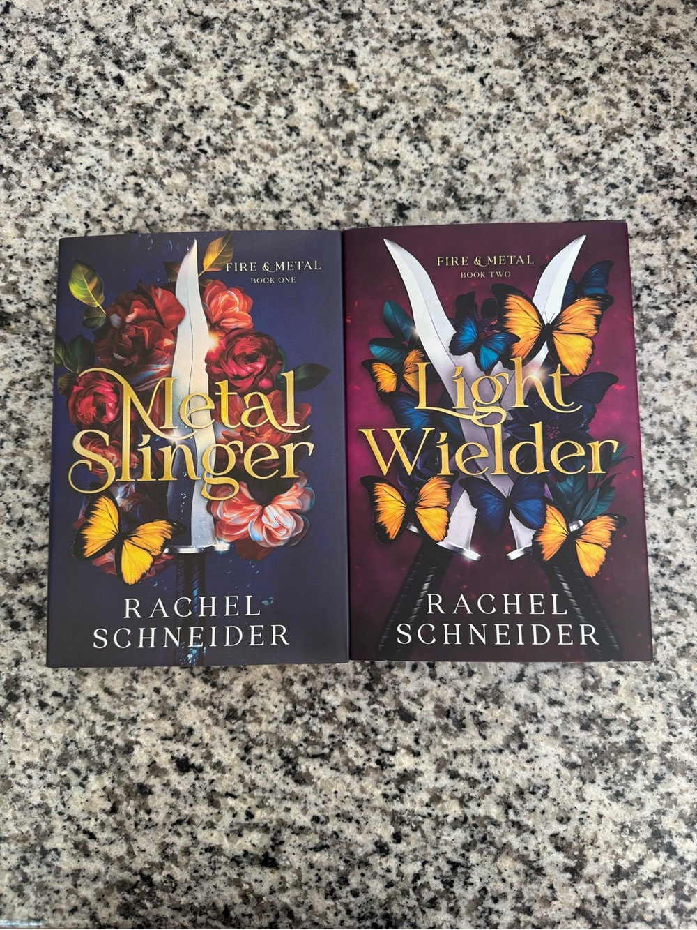 Metal Slinger/light wielder deluxe edition hardcovers by Rachel Schneider